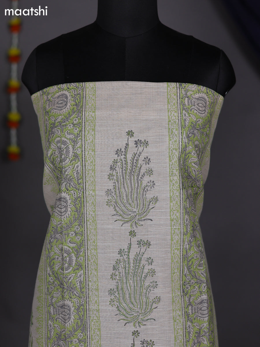 Off White and Pastel Green Chanderi Dress Material With Allover Prints
