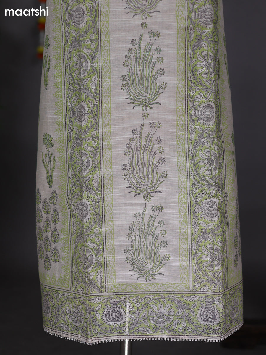 Off White and Pastel Green Chanderi Dress Material With Allover Prints