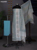 Off White and Teal Blue Chanderi Dress Material With Allover Prints