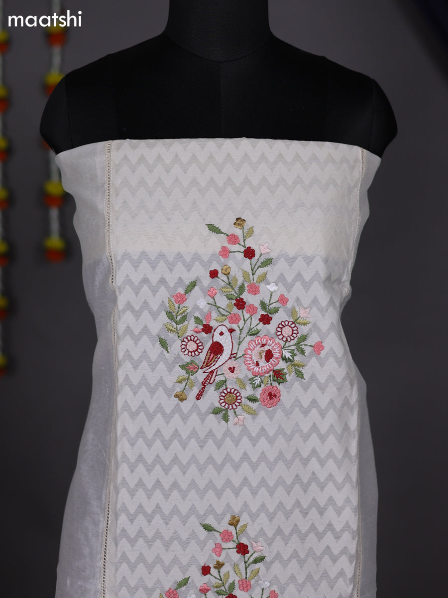 Off White and Peach Shade Chanderi Dress Material With Embroidery Work Pattern