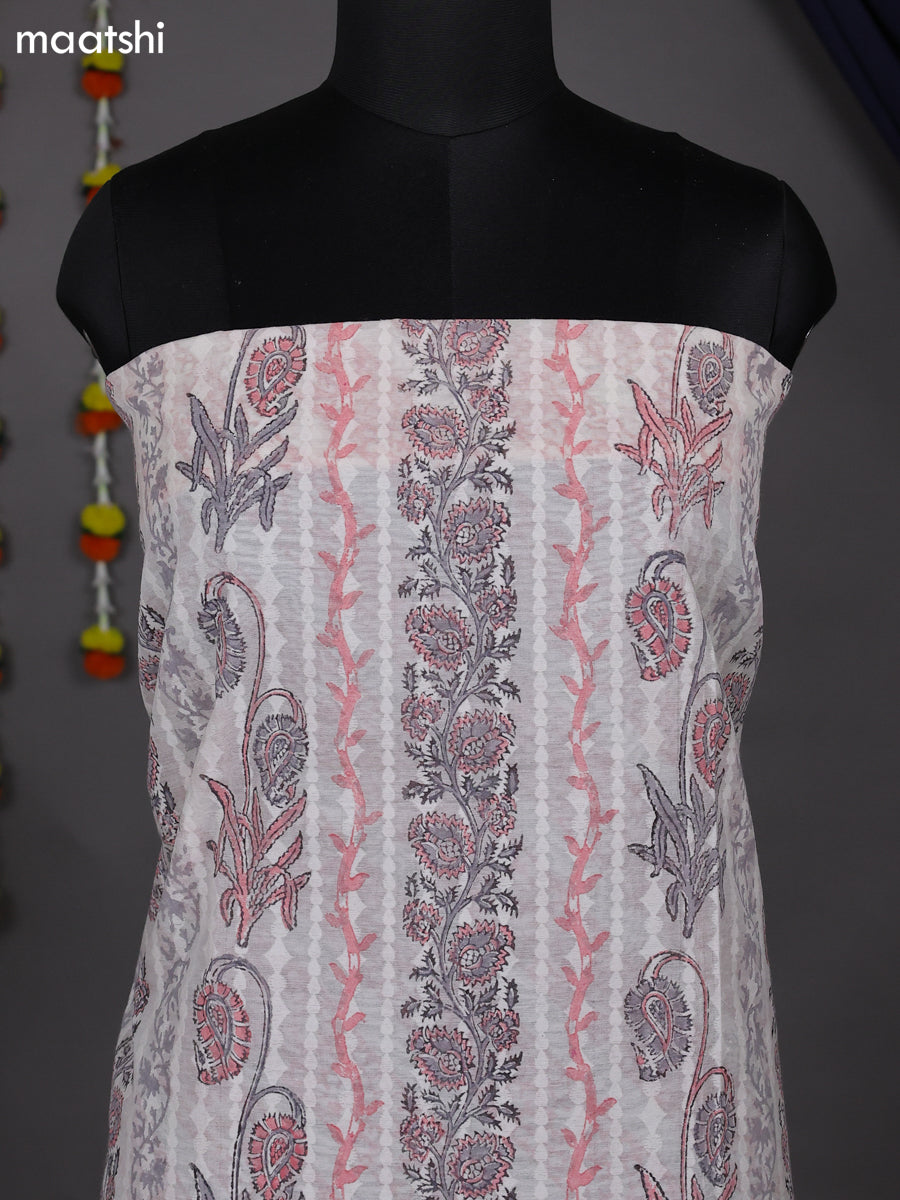 Off White and Peach Shade Cotton Dress Material With Allover Prints