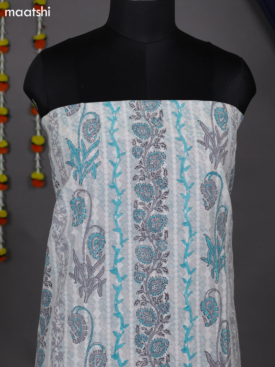 Off White and Teal Blue Cotton Dress Material With Allover Prints