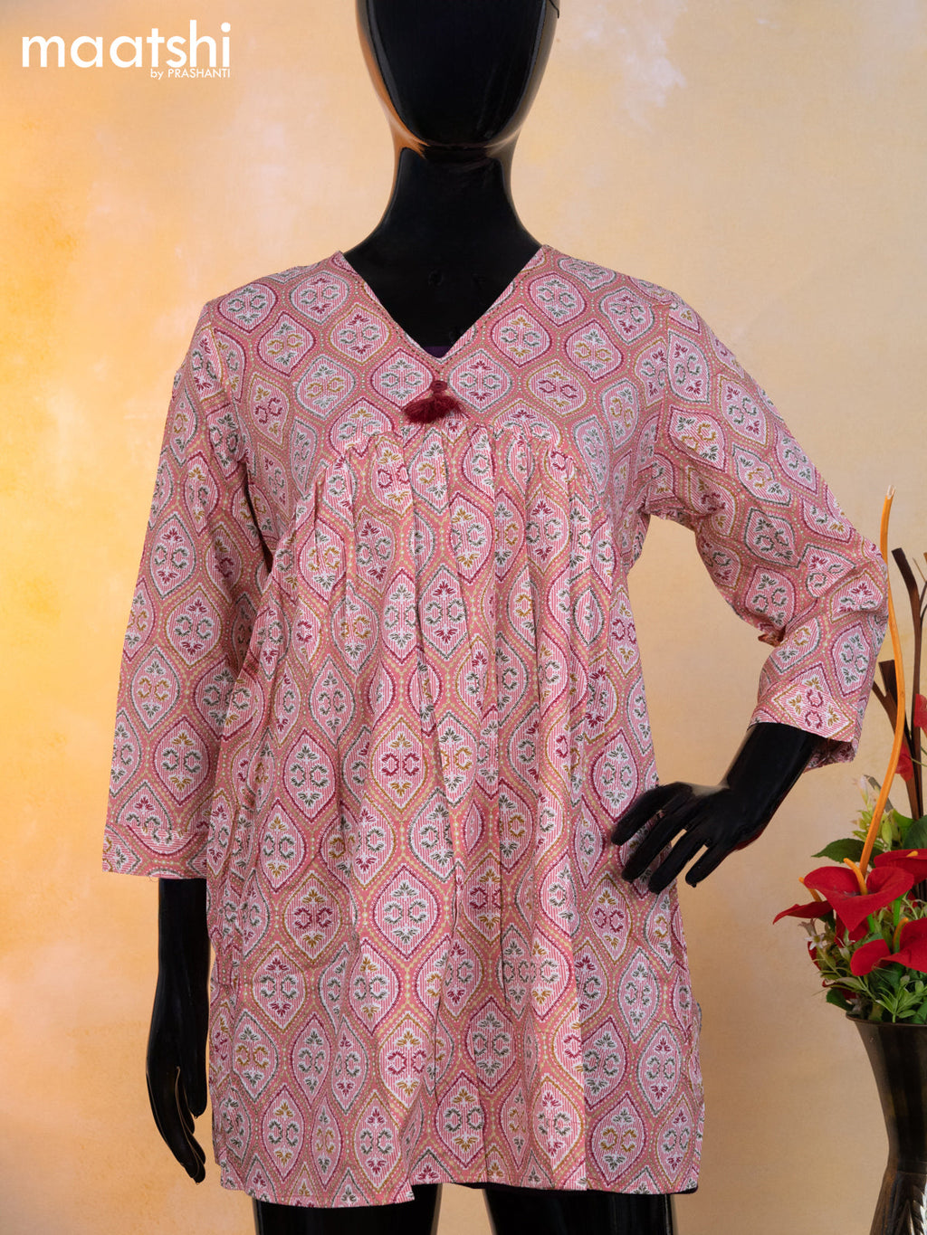 Cotton readymade short umbrella kurti peach pink with allover prints & alia cut neck pattern without pant