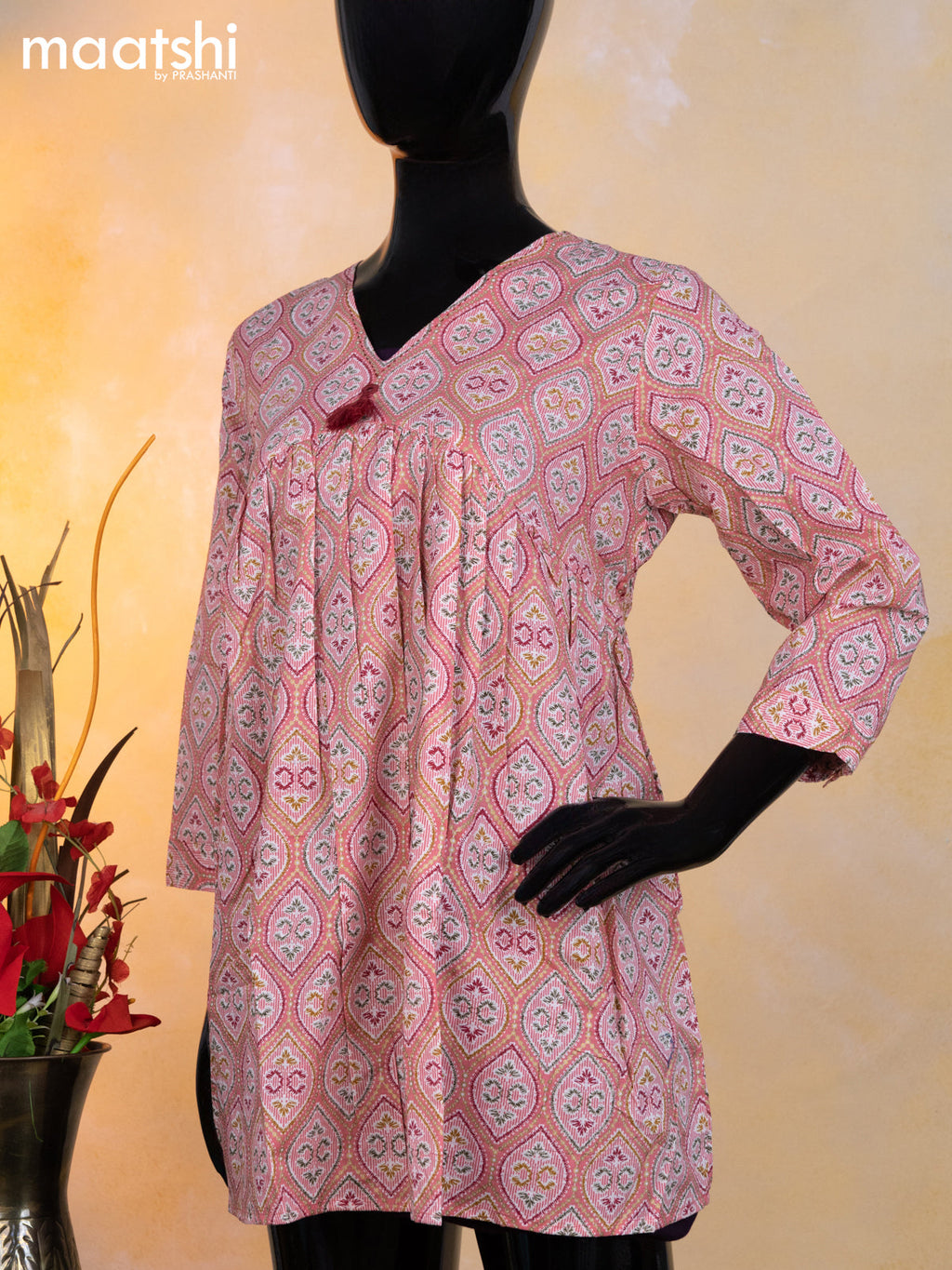 Cotton readymade short umbrella kurti peach pink with allover prints & alia cut neck pattern without pant
