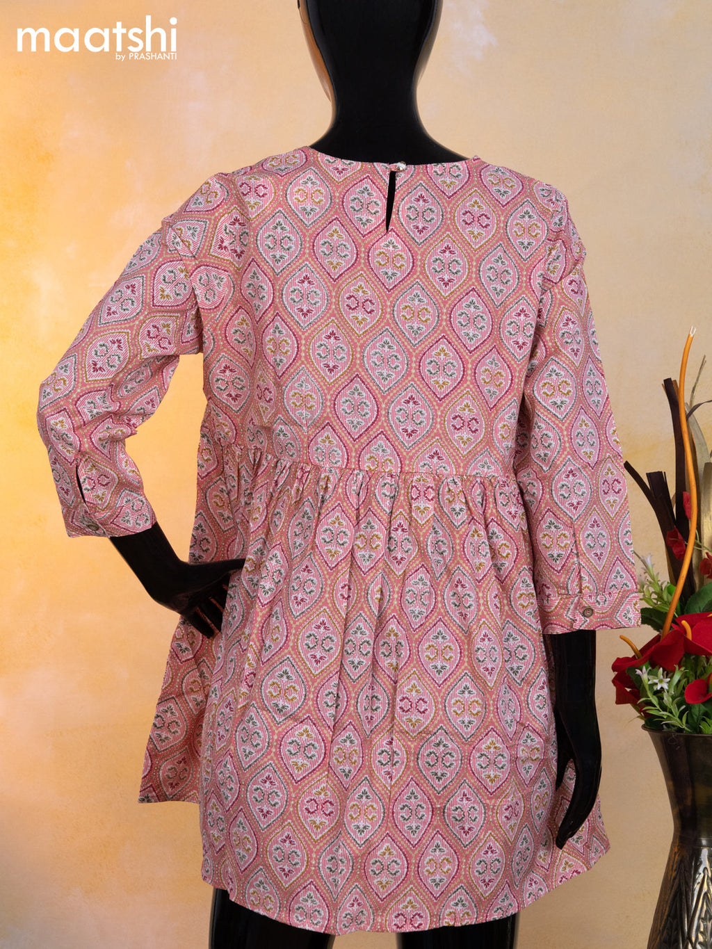 Cotton readymade short umbrella kurti peach pink with allover prints & alia cut neck pattern without pant