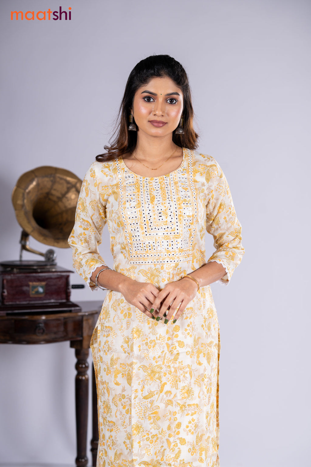 Rayon kurti cream and yellow with allover floral prints & embroidery mirror work neck pattern and straight cut pant