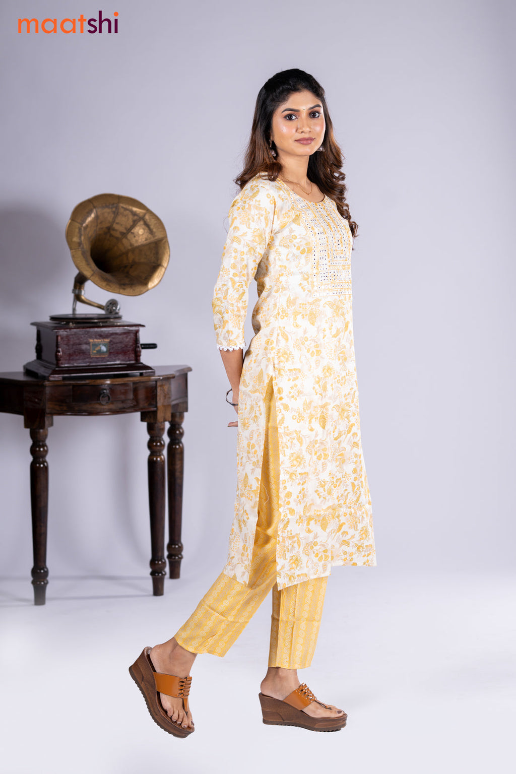 Rayon kurti cream and yellow with allover floral prints & embroidery mirror work neck pattern and straight cut pant