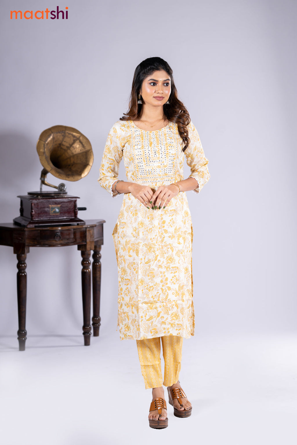 Rayon kurti cream and yellow with allover floral prints & embroidery mirror work neck pattern and straight cut pant