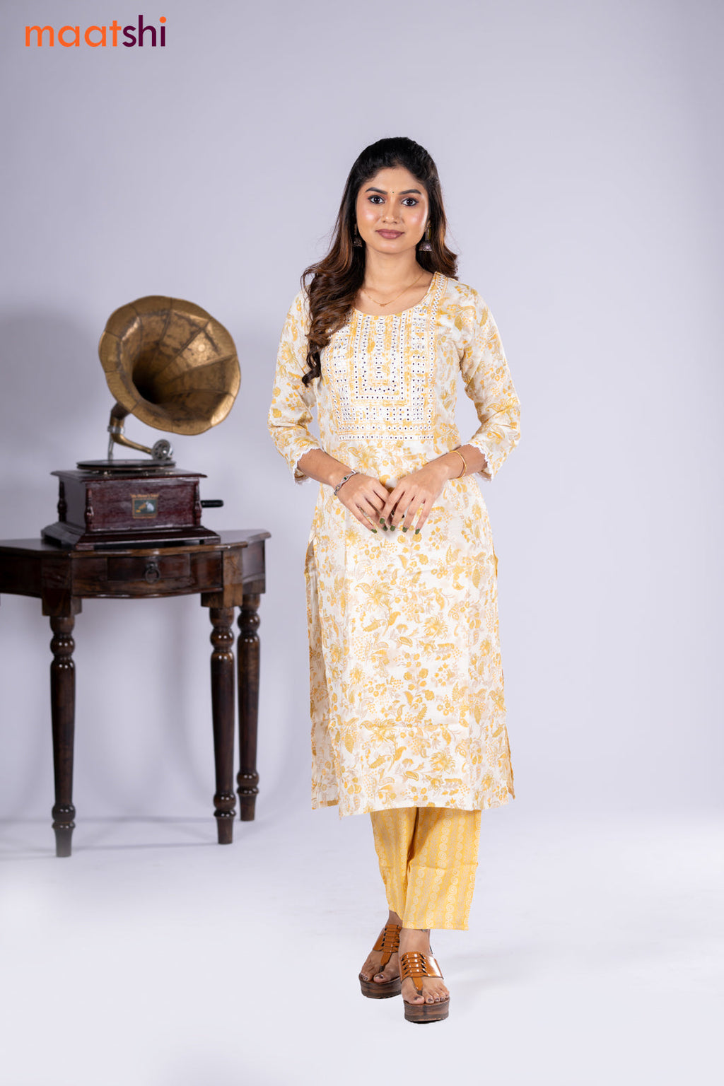 Rayon kurti cream and yellow with allover floral prints & embroidery mirror work neck pattern and straight cut pant