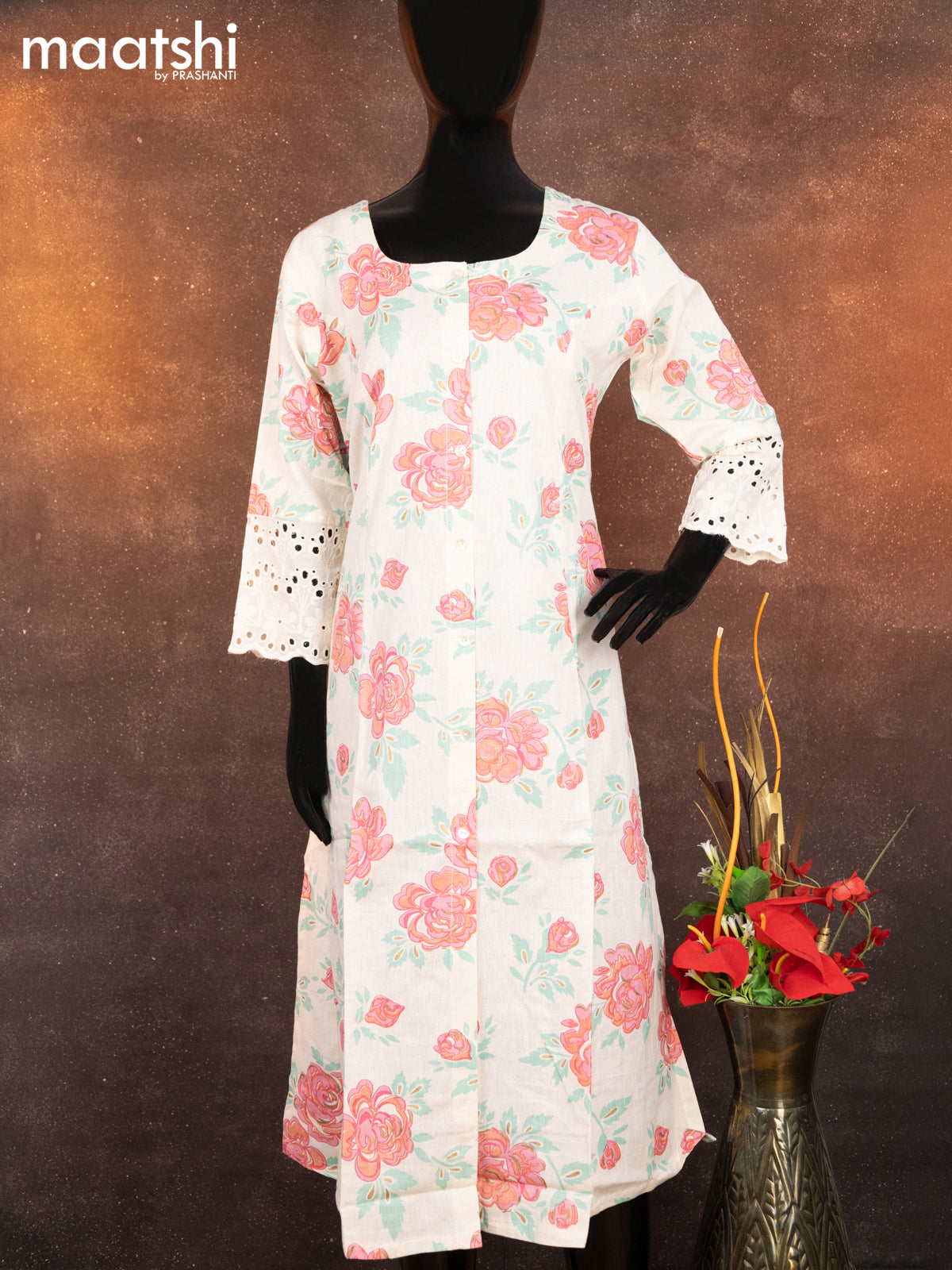 Cotton readymade A-line kurti off white and pink with allover floral prints & simple neck pattern without pant
