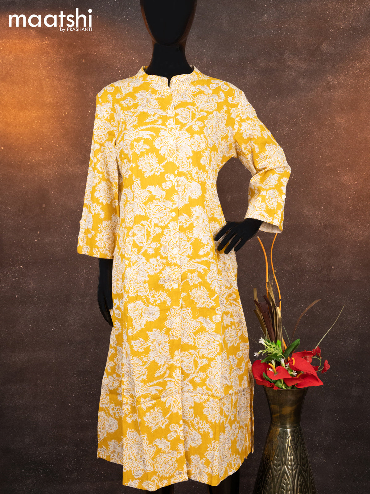 Cotton readymade A-line kurti yellow and off white with allover floral prints & simple neck pattern without pant