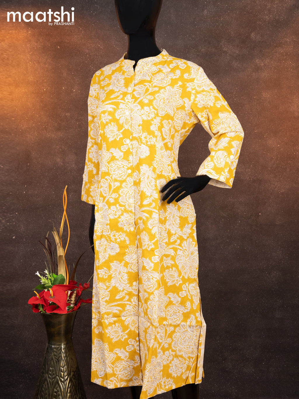 Cotton readymade A-line kurti yellow and off white with allover floral prints & simple neck pattern without pant
