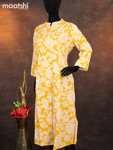 Cotton readymade A-line kurti yellow and off white with allover floral prints & simple neck pattern without pant