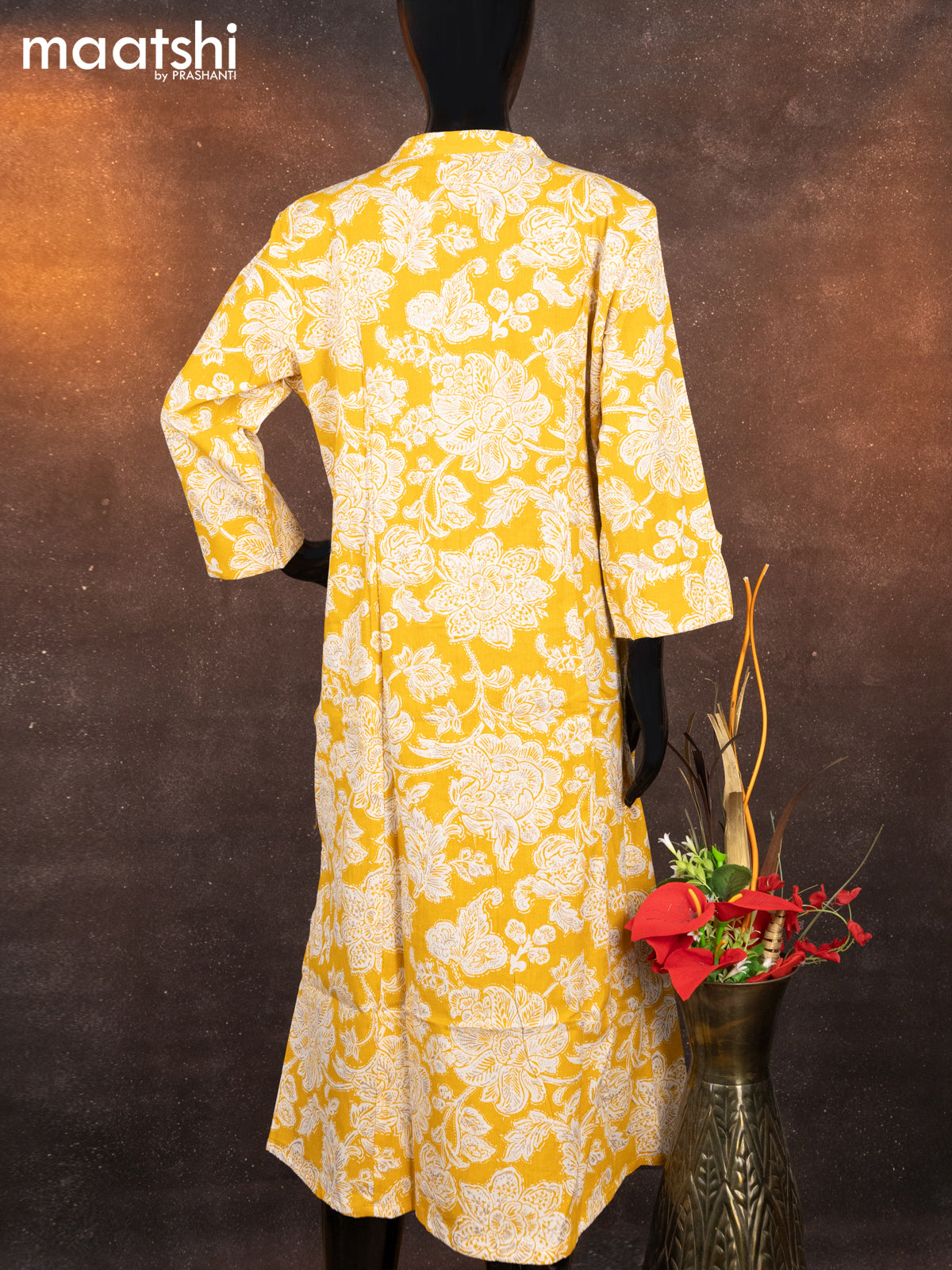 Cotton readymade A-line kurti yellow and off white with allover floral prints & simple neck pattern without pant