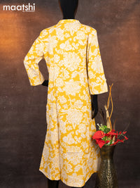 Cotton readymade A-line kurti yellow and off white with allover floral prints & simple neck pattern without pant