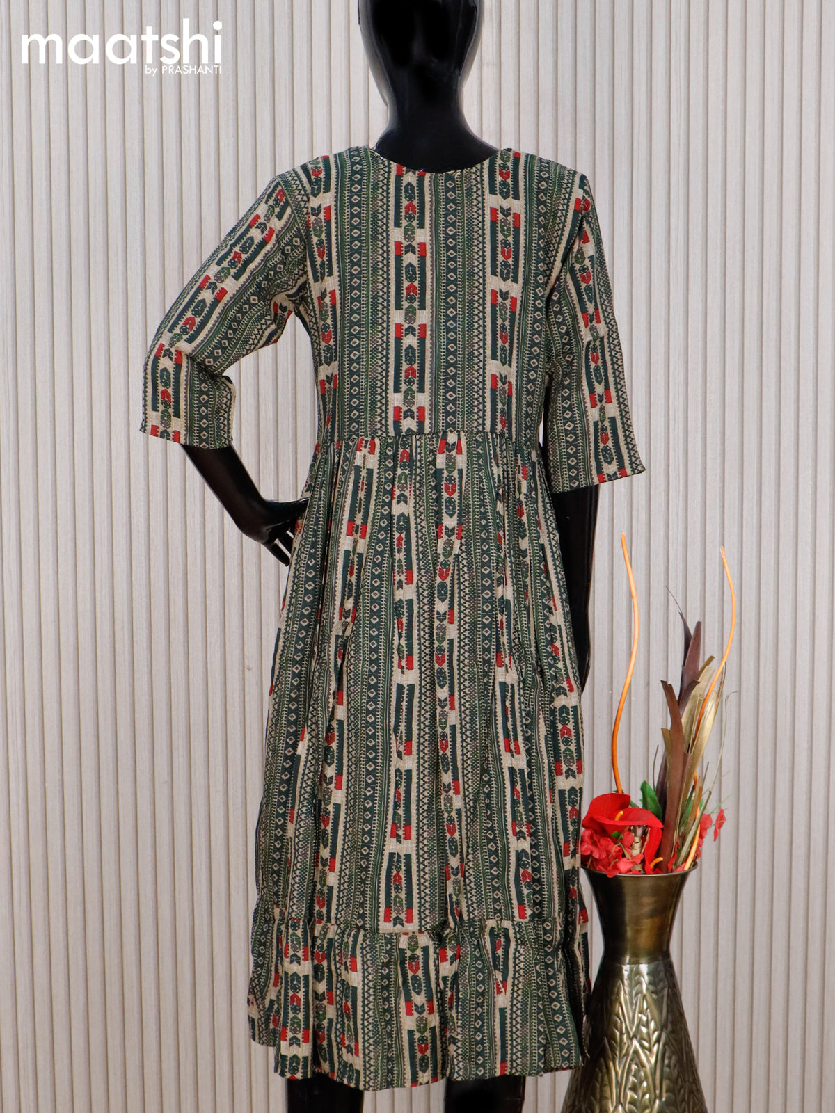 Rayon readymade umbrella kurti beige and bottle green with allover prints & simple neck pattern without pant