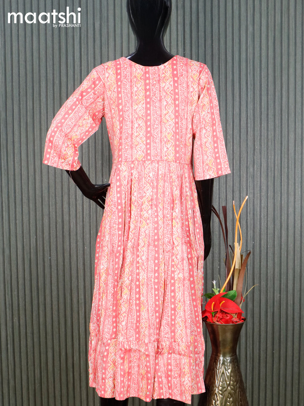 Rayon readymade umbrella kurti pink and cream with allover prints & simple neck pattern without pant