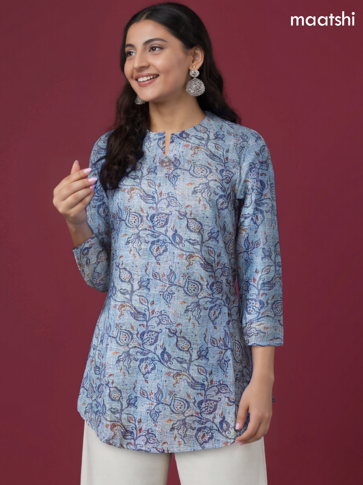 Rayon readymade short kurti pastel blue with allover prints & simple neck pattern without pant