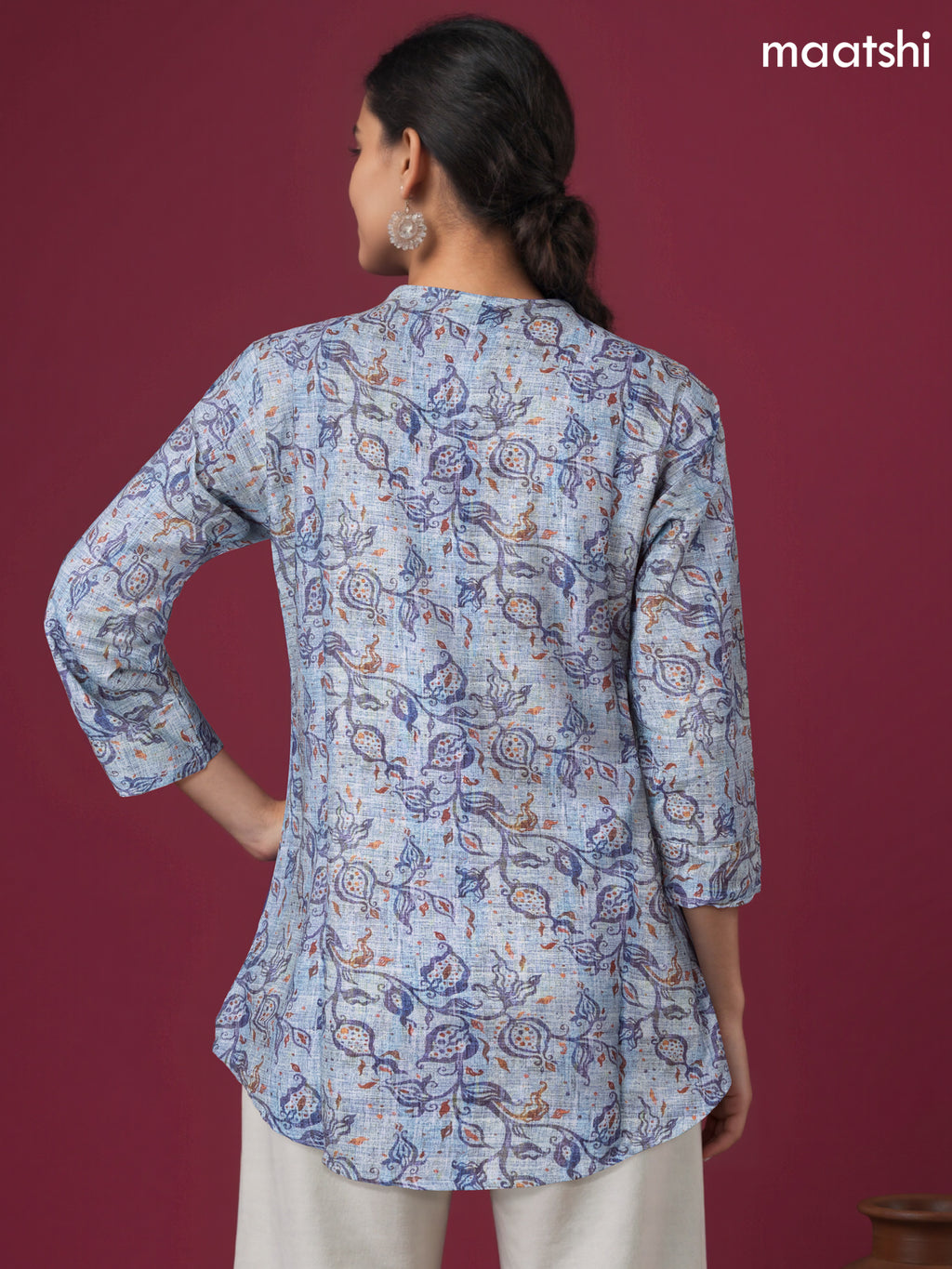 Rayon readymade short kurti pastel blue with allover prints & simple neck pattern without pant