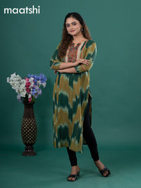 Cotton readymade kurti green and mustard shade with allover ikat prints & ajrakh patch work neck pattern without pant