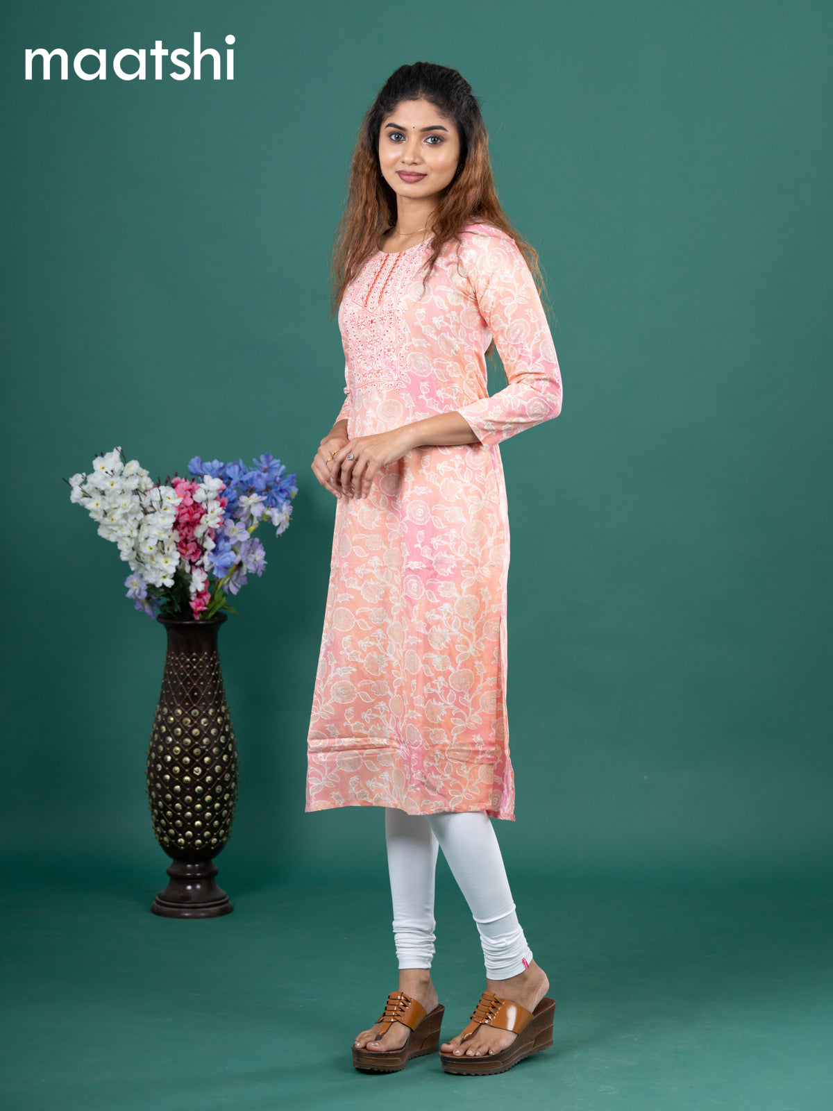 Cotton readymade kurti peach shade with allover floral prints & embroidery mirror work neck pattern without pant