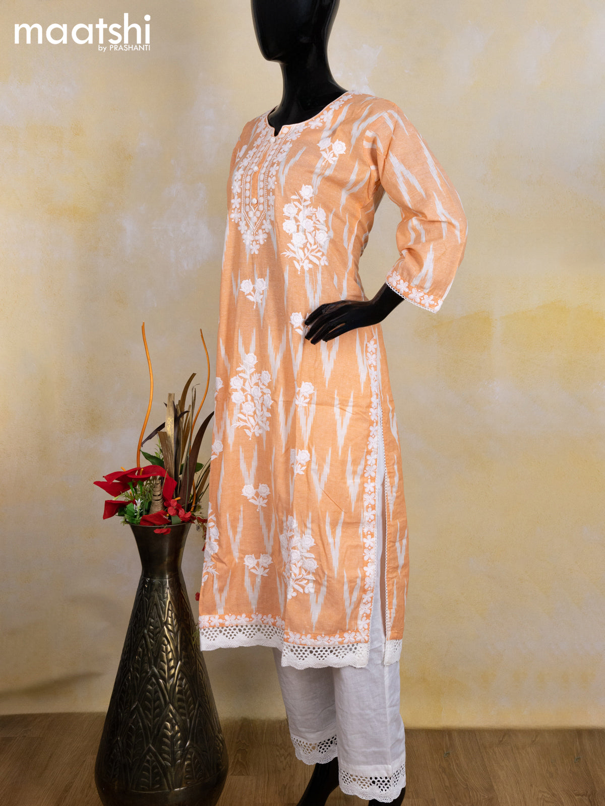 Cotton readymade salwar suit pale orange and off white with allover ikat weaves & embroidery work neck pattern and bottom & cotton dupatta