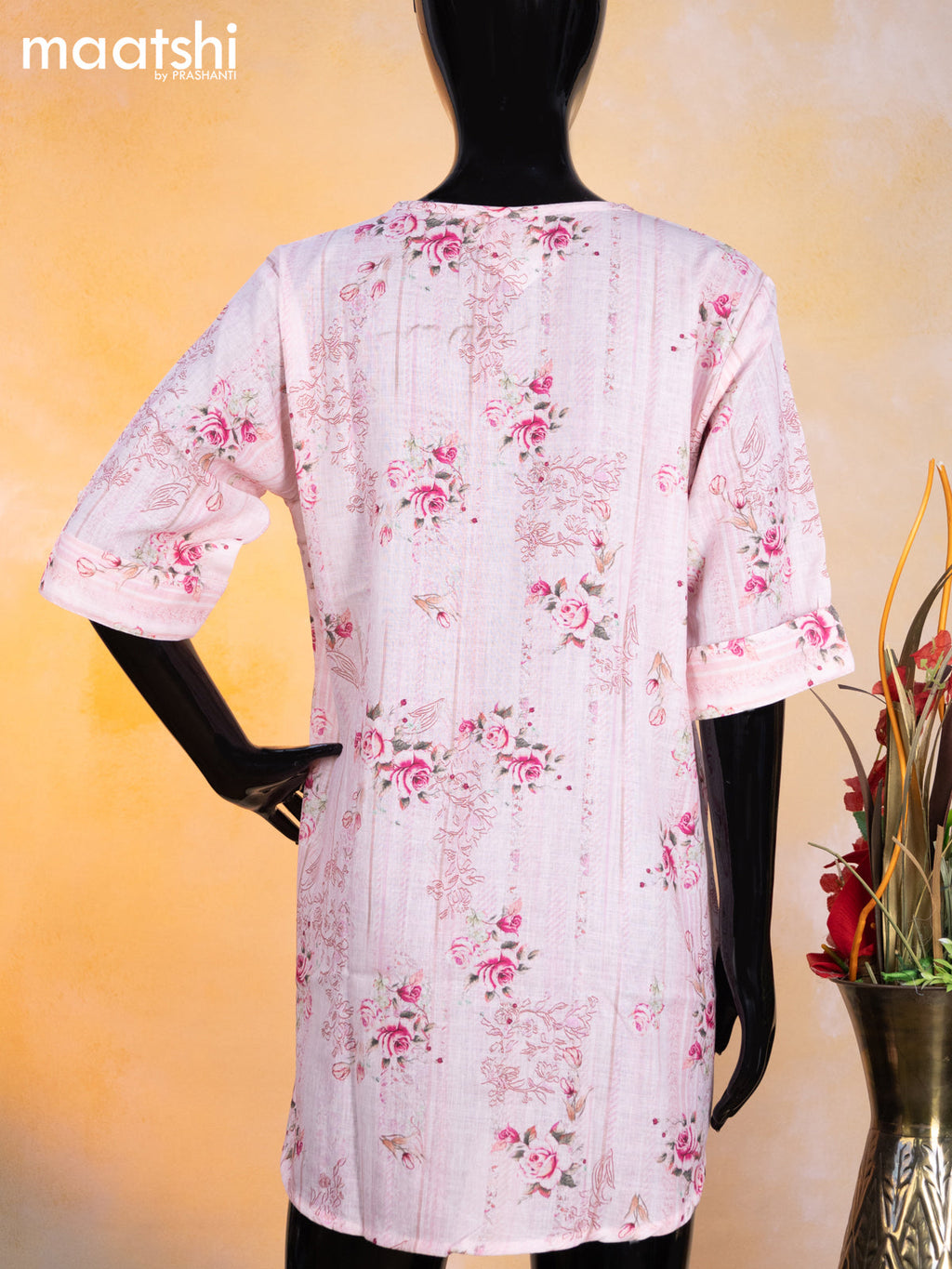 Cotton readymade short kurti baby pink with allover floral prints & simple neck pattern without pant