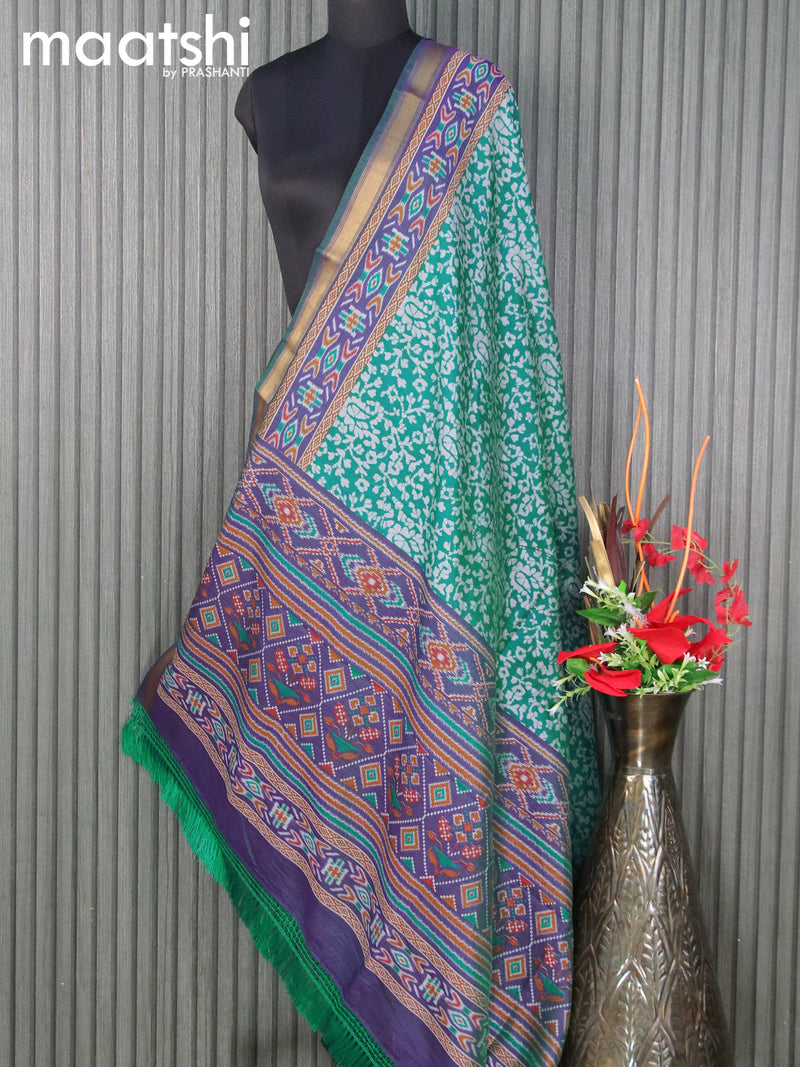 Semi tussar dupatta teal green and dual shade of blue with allover batik prints and zari woven border