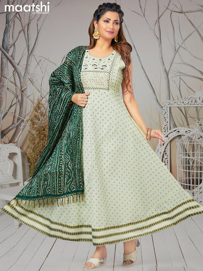 Chanderi readymade party anarkali salwar suit mild pista green with allover butta prints & embroidery mirror work neck pattern and straight cut pant & bandhani dupatta
