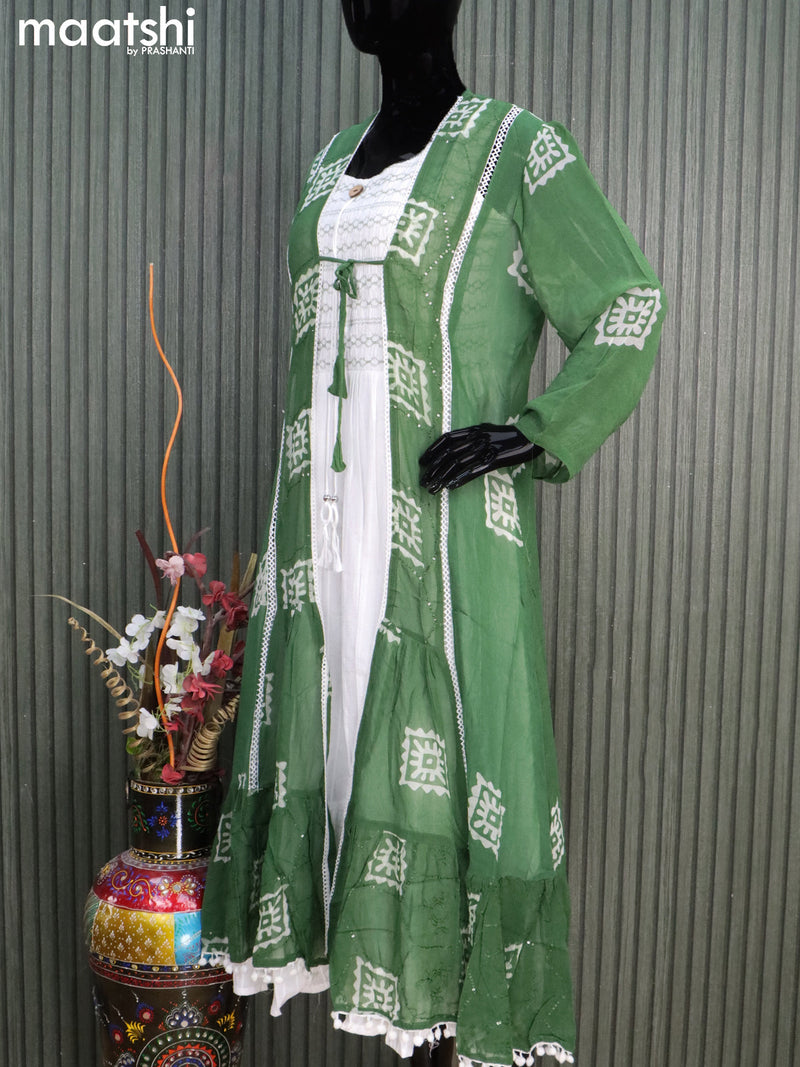 Cotton readymade coat type dress off white and green with allover thread weaves & smoking neck pattern  without pant & sleeve attached