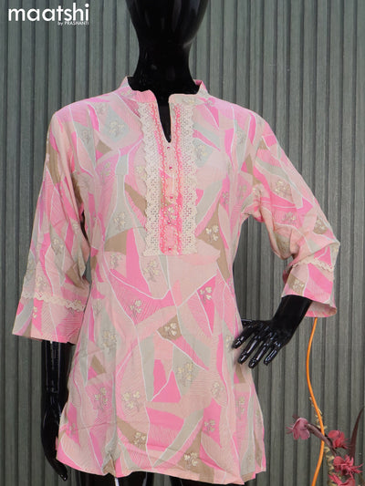 Rayon readymade short kurti peach pink shade with allover prints & embroidery work neck pattern without pant