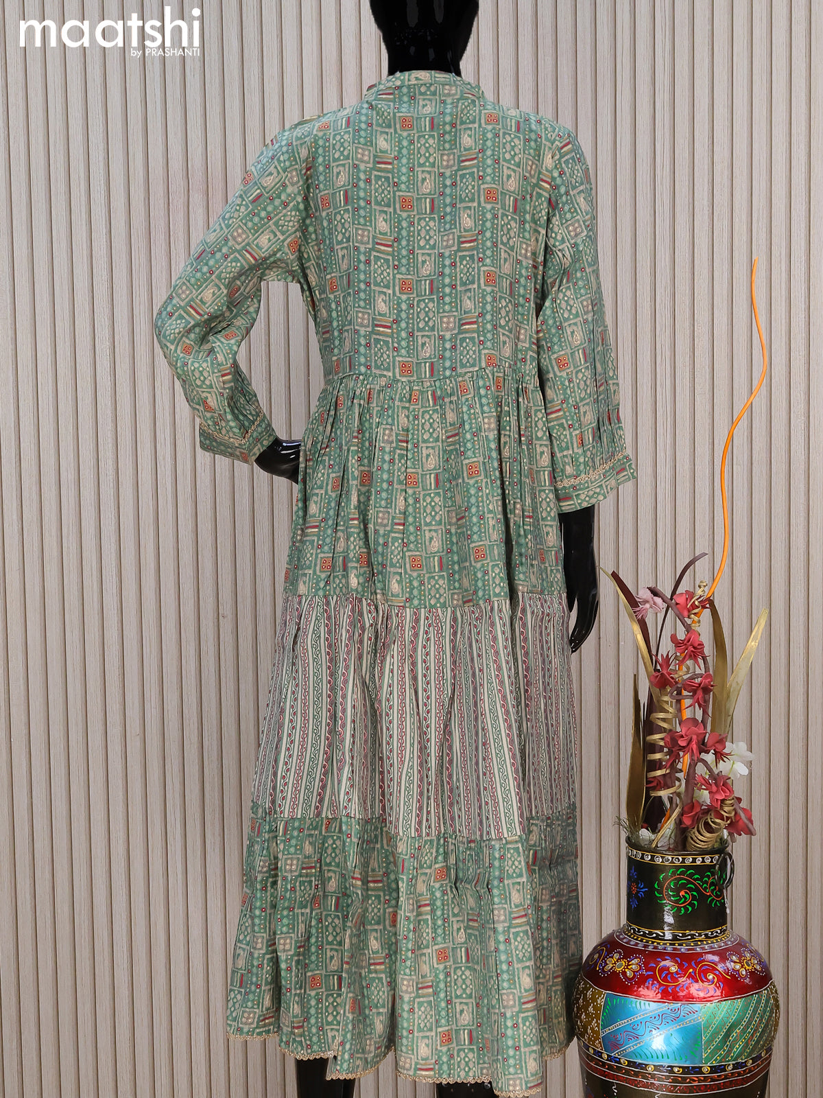Modal readymade umbrella kurti pastel green with allover prints & beaded work neck pattern without pant