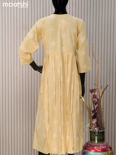 Rayon readymade umbrella kurti pale yellow with prints & sequin work neck pattern without pant