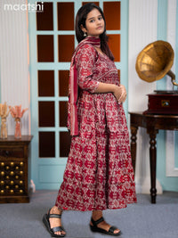 Muslin readymade alia cut salwar sutis maroon with allover prints & mirror work neck pattern and straight cut pant & printed dupatta