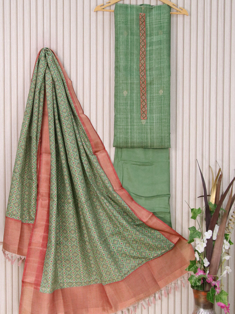 Semi tussar dress material green with zari woven buttas & patch work neck pattern and bottom & printed dupatta