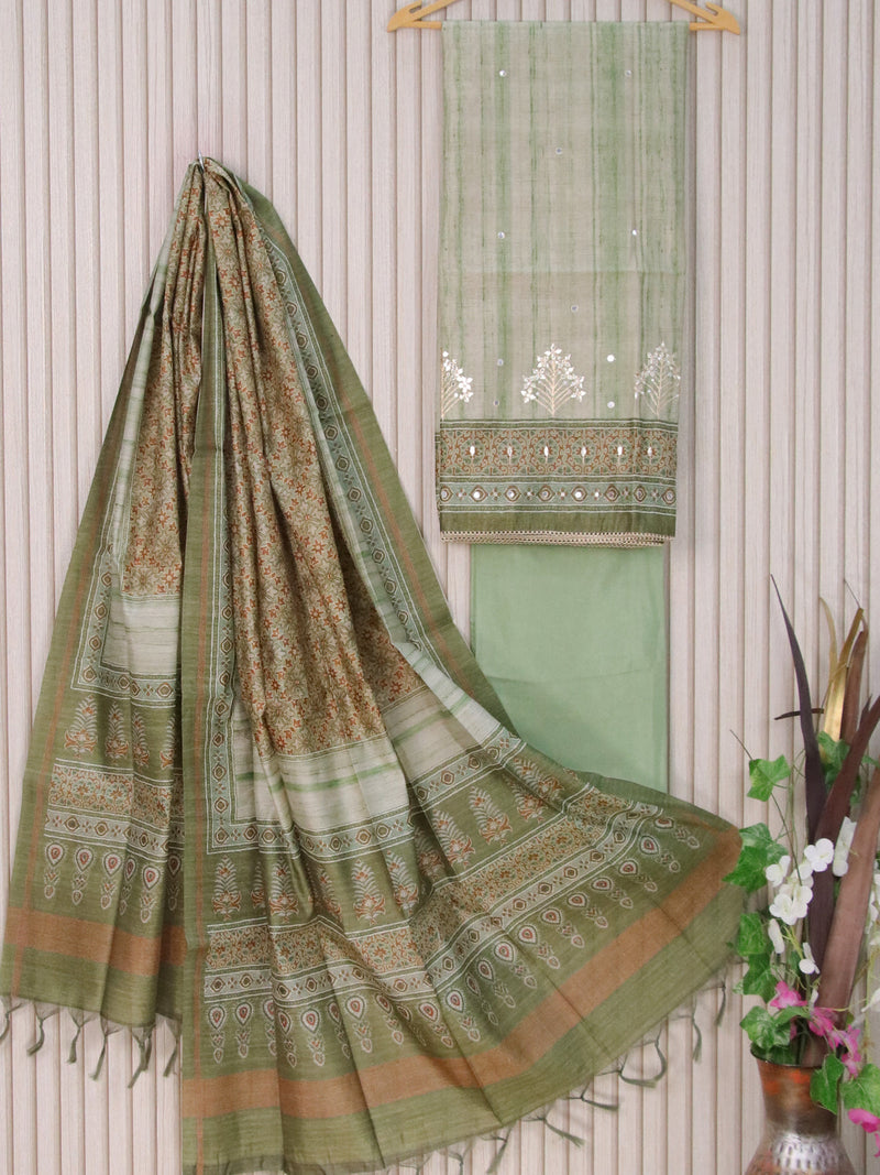 Semi tussar dress material pastel green shade with allover mirror work and bottom & printed dupatta