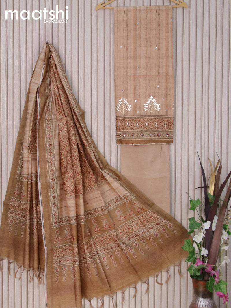 Semi tussar dress material beige with allover mirror work and bottom & printed dupatta