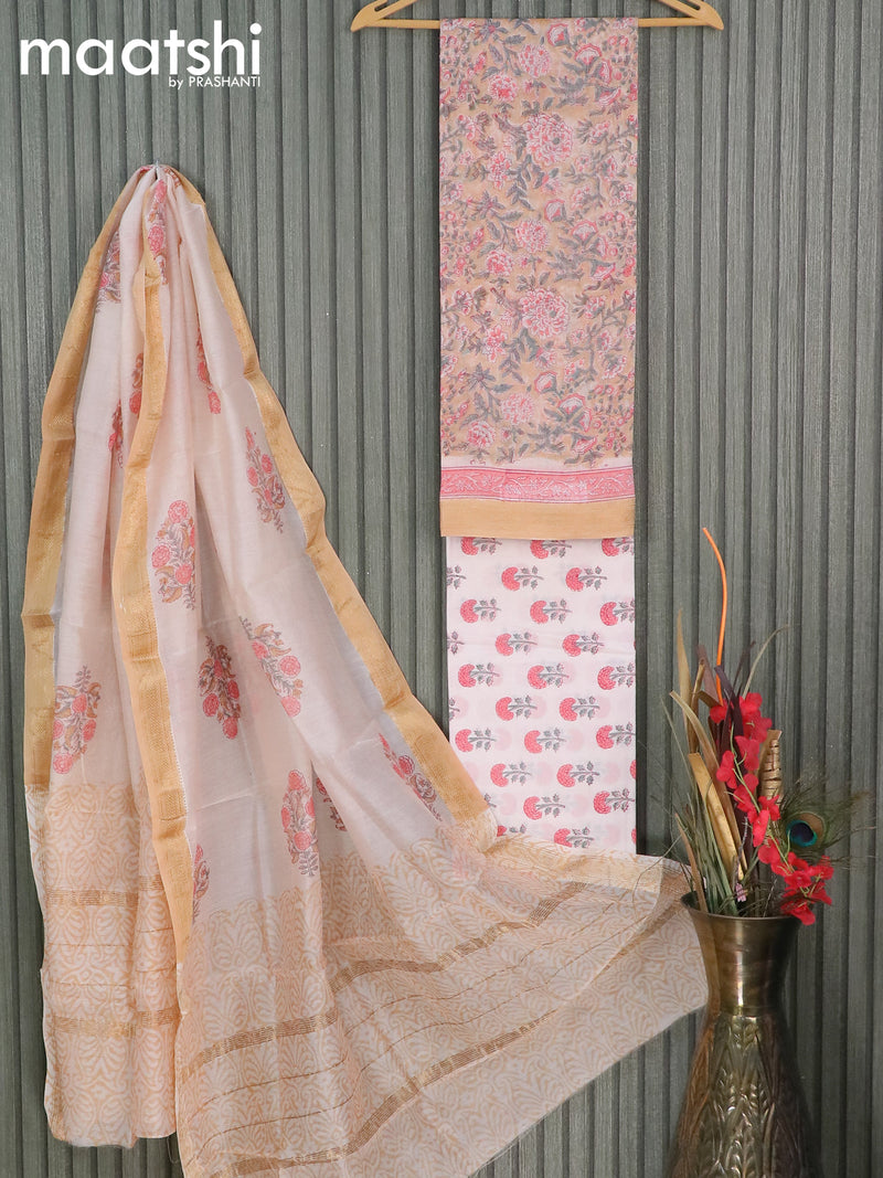 Chanderi dress material sandal and off white with allover floral prints and maheshwari border