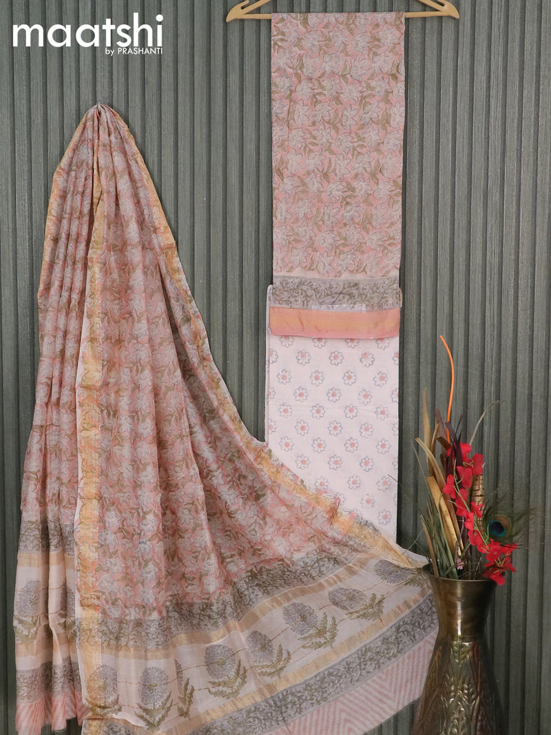 Chanderi dress material pastel peach and off white with allover floral prints and maheshwari border