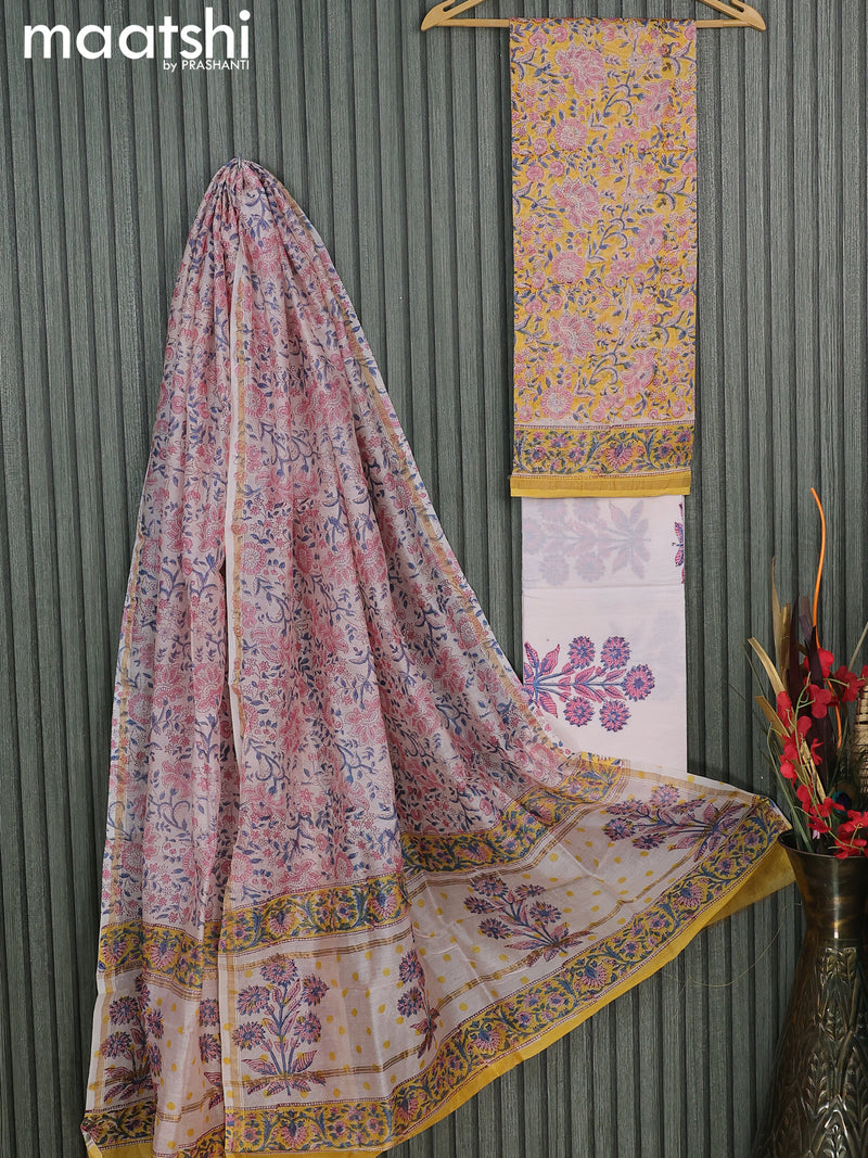 Chanderi dress material yellow and off white with allover floral prints and small zari woven border
