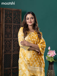 Cotton readymade salwar suit yellow shade with allover prints & embroidery lace work neck pattern and straight cut pant & cotton dupatta