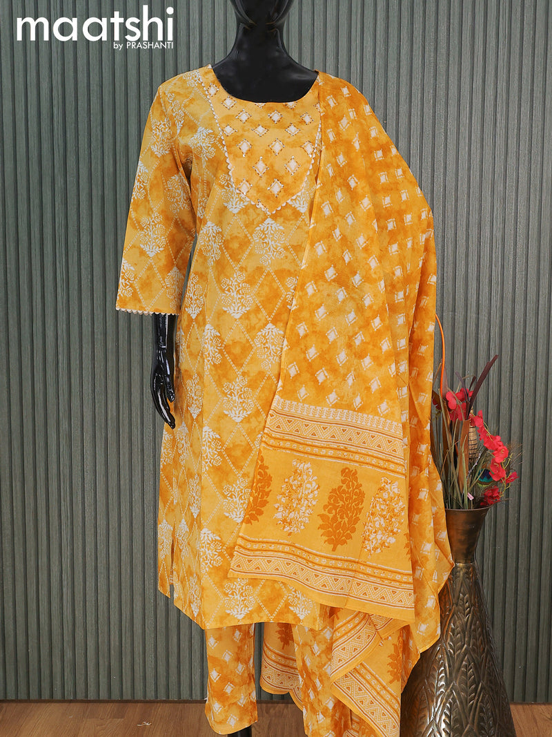 Cotton readymade salwar suits yellow shade with allover prints & embroidery lace work neck pattern and straight cut pant & cotton dupatta