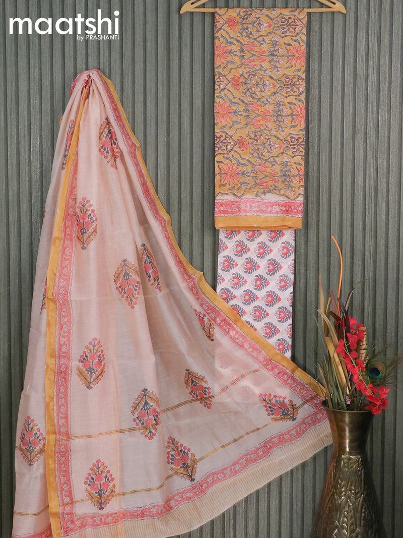 Pure chanderi dress material yellow and off white with allover floral prints and small zari woven border