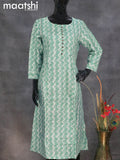 Semi tussar readymade A-line kurti teal blue shade with allover batik zig zag prints without pant