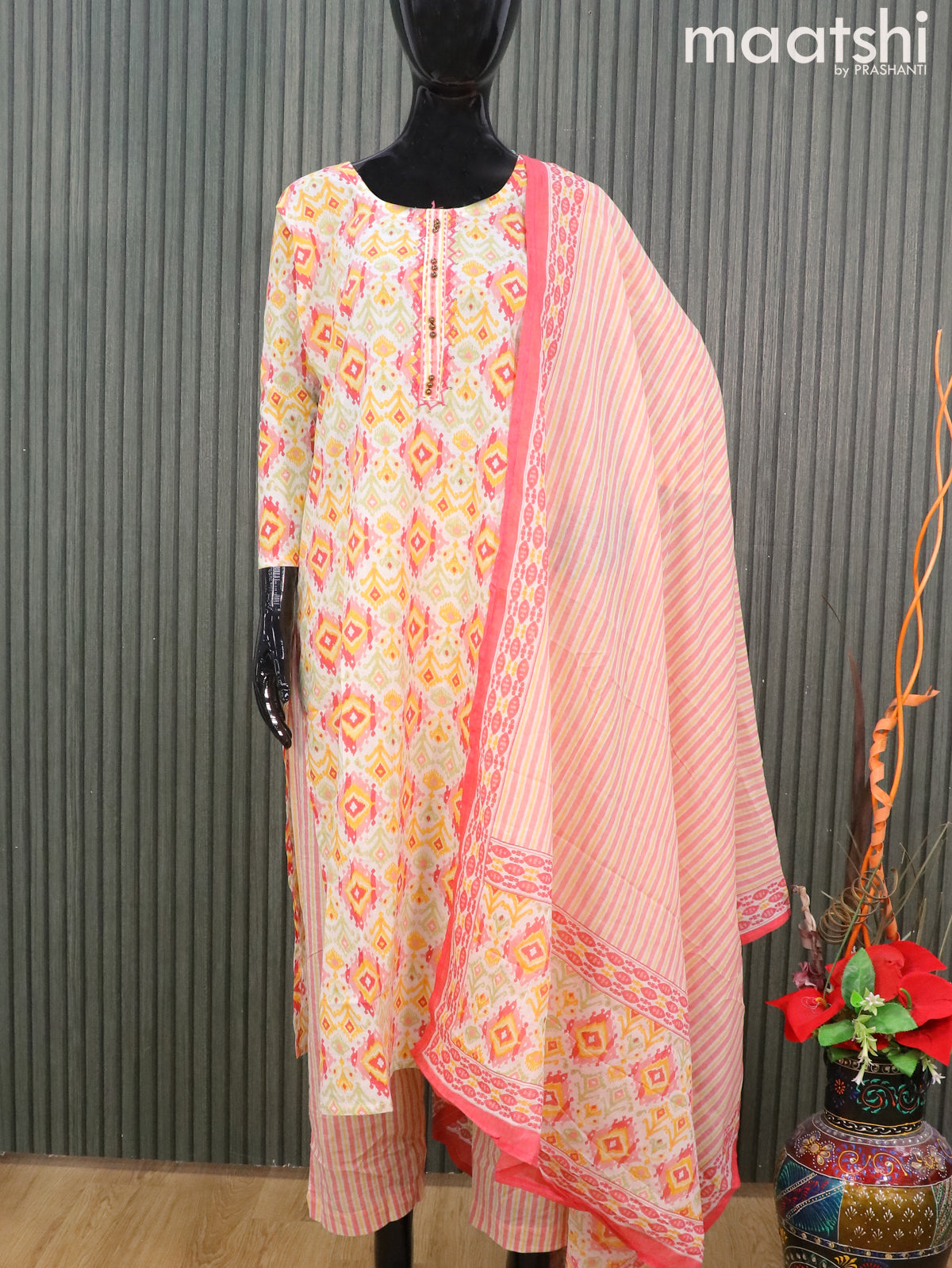 Cotton readymade salwar suits off white and yellow with allover ikat prints & sequin work neck pattern and straight cut pant & printed dupatta