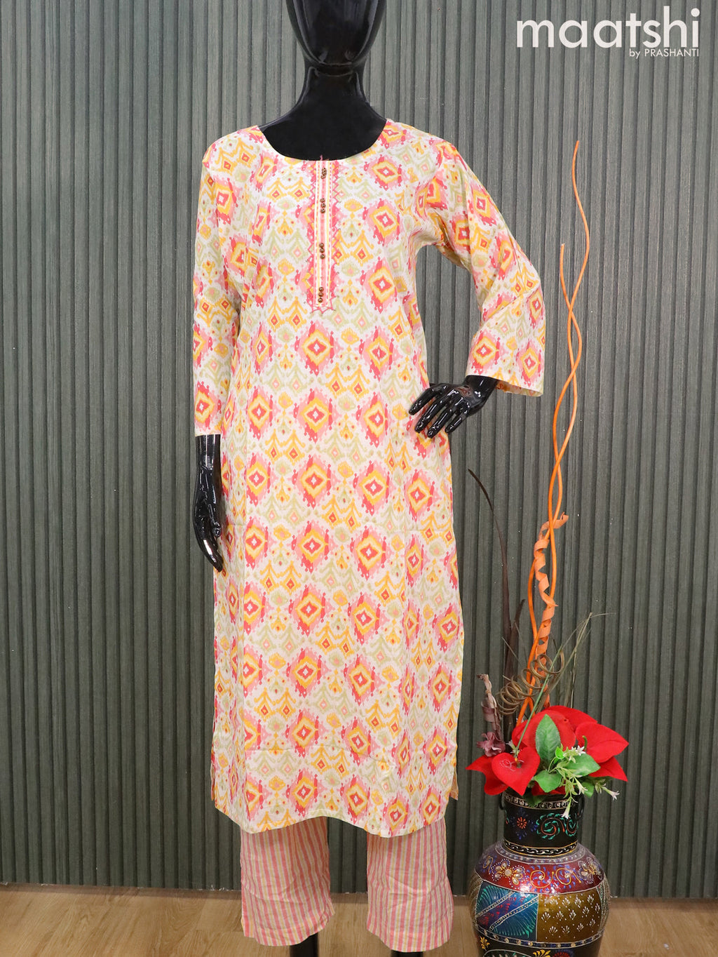 Cotton readymade salwar suits off white and yellow with allover ikat prints & sequin work neck pattern and straight cut pant & printed dupatta