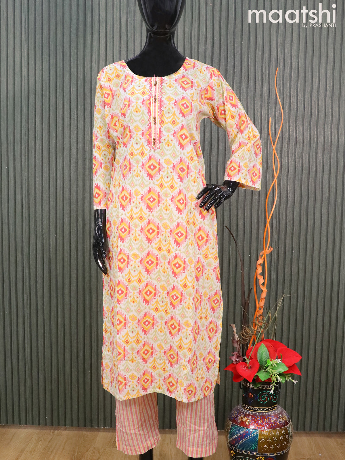 Cotton readymade salwar suits off white and yellow with allover ikat prints & sequin work neck pattern and straight cut pant & printed dupatta