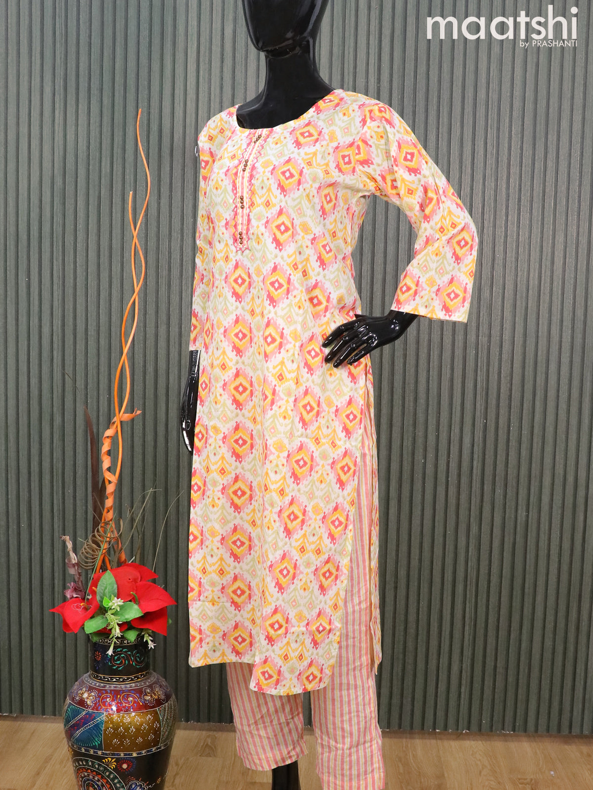 Cotton readymade salwar suits off white and yellow with allover ikat prints & sequin work neck pattern and straight cut pant & printed dupatta