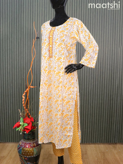 Cotton readymade salwar suits off white and yellow with allover floral prints & embroidery work neck pattern and straight cut pant & printed dupatta