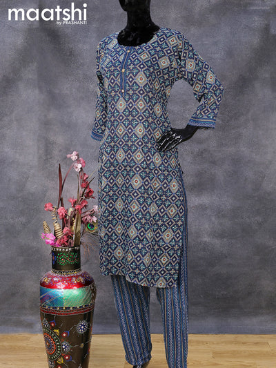 Rayon readymade kurti set navy blue with allover ikat prints & simple neck pattern and straight cut pant
